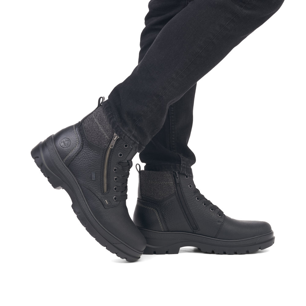 Rieker F5401-00 miesten nastakengät pakkauksessa, vettähylkivä malli